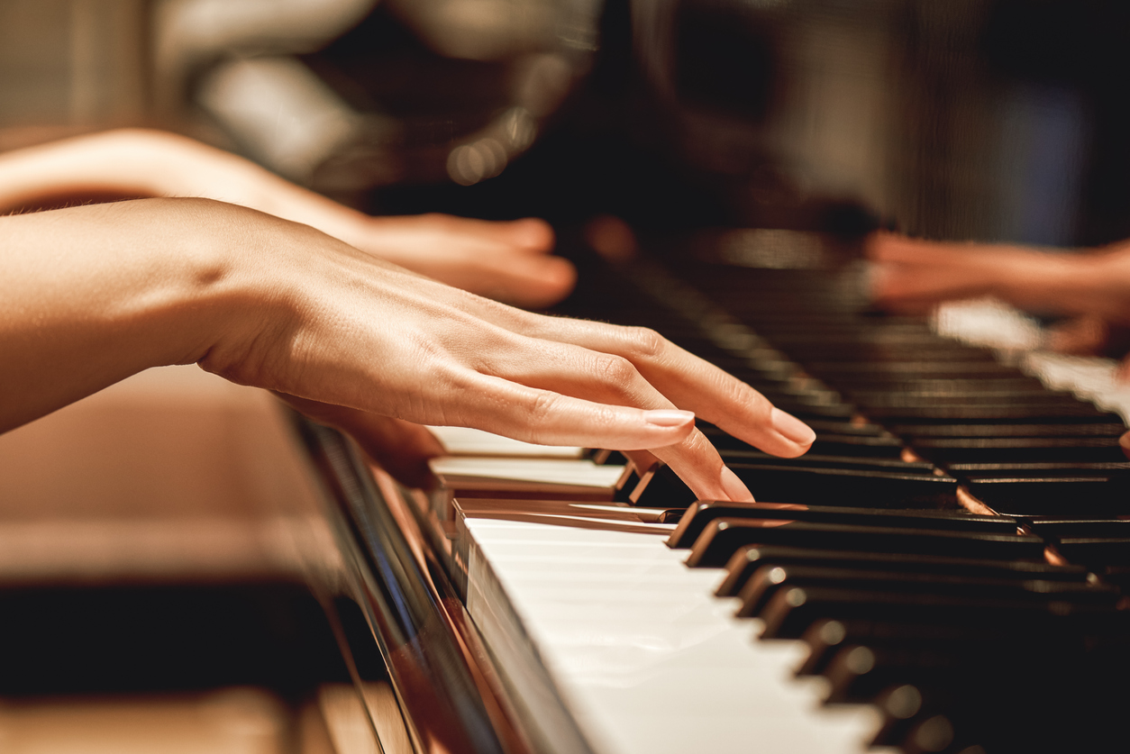 favorite-classical-music-close-up-view-of-gentle-female-hands-playing-a